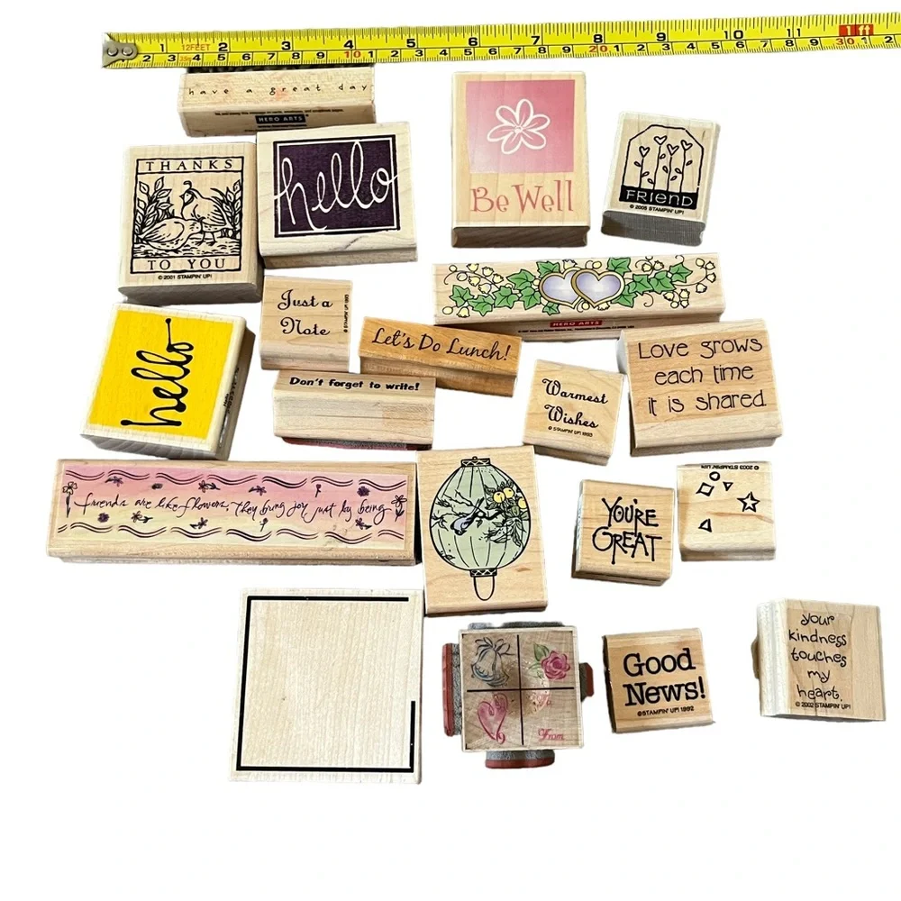Lot of 20 rubber stamps. Most of the stamps are brand new.